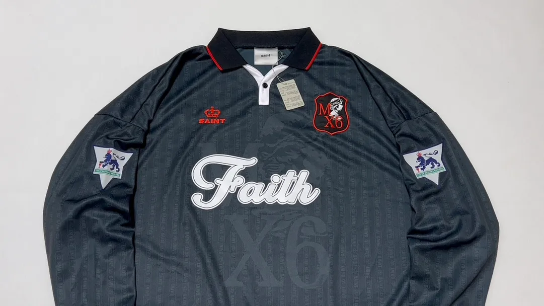 SAINT M×××××× SOCCER SHIRT 'FAITH'/BLK FAITH Football Long Sleeve Black S-XL This design has a lot of craftsmanship Digital fabric printing/front positioning printing laser cutting Offset printing + flocking printing + embossing Imported Behringer machine embroidery Flat machine collar + cuffs Genuine consistent main mark/wash mark/cherub mark